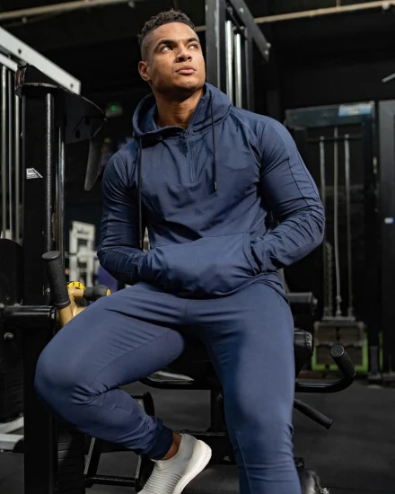 Felpa da palestra con cappuccio vestibilità ampia da uomo elegante 2 pezzi + pantaloni da jogging con tasca con cerniera Tuta da fitness Felpa con cappuccio casual Tuta sportiva da atletica