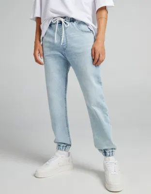 Jeans da jogging in denim morbido con fondo a campana elastico di design da uomo all'ingrosso